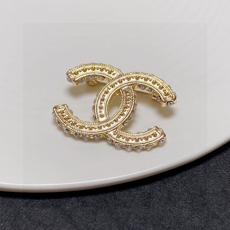 Ch*el brooches